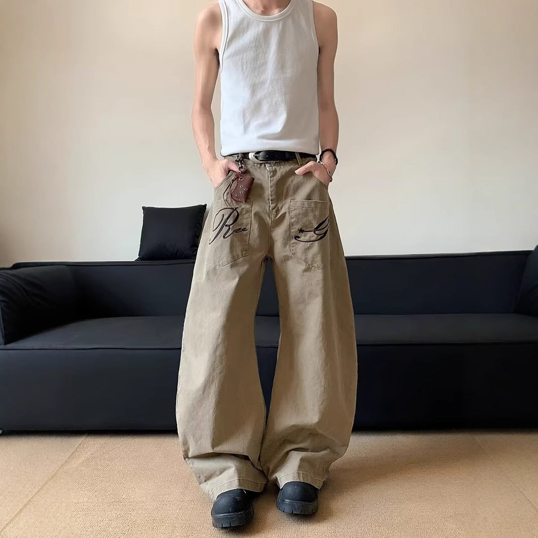 Reverse pocket design embroidered letter jeans with a curved silhouette, loose floor-length pants for women